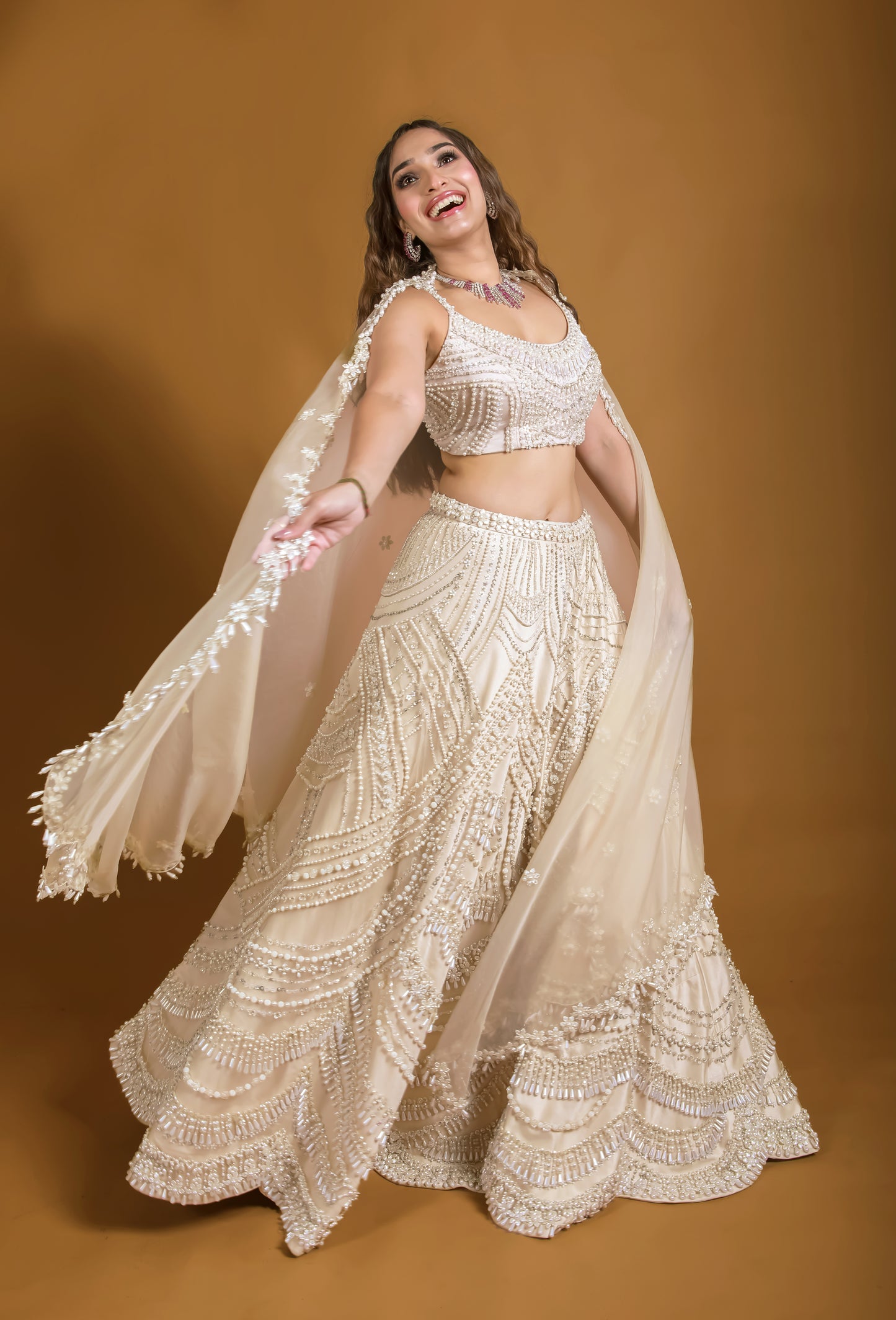 Tasheen Rahimtoola in Champagne Queen of Pearl Lehenga Set