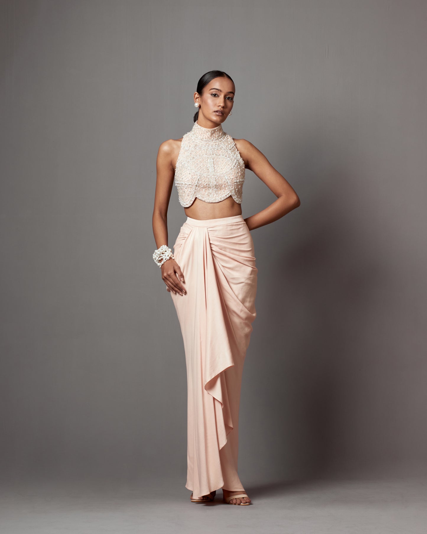 Meghana Kaur in Pastel Pink Dull Crepe Satin Wrap Skirt Set