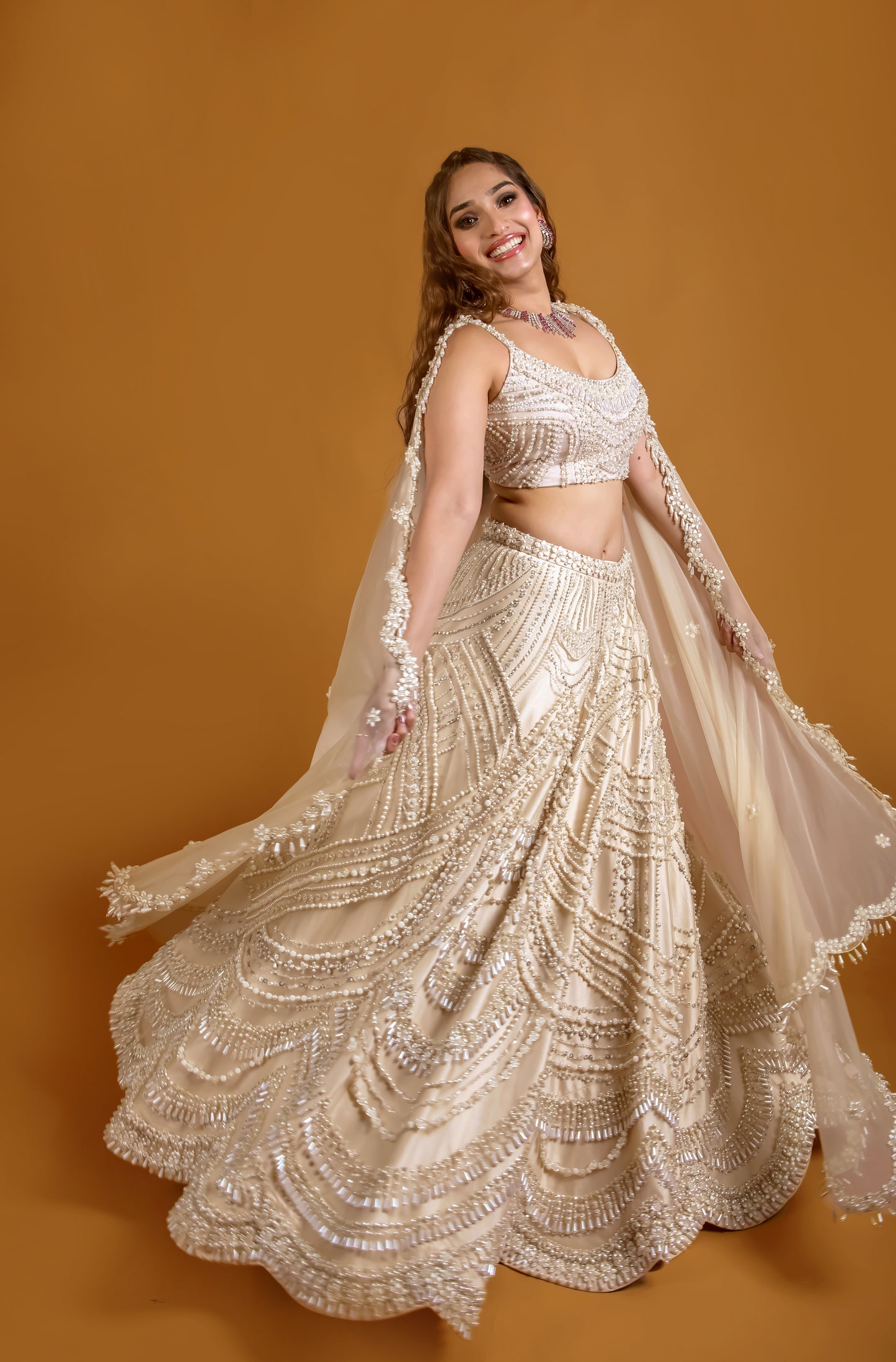 Tasheen Rahimtoola in Champagne Queen of Pearl Lehenga Set
