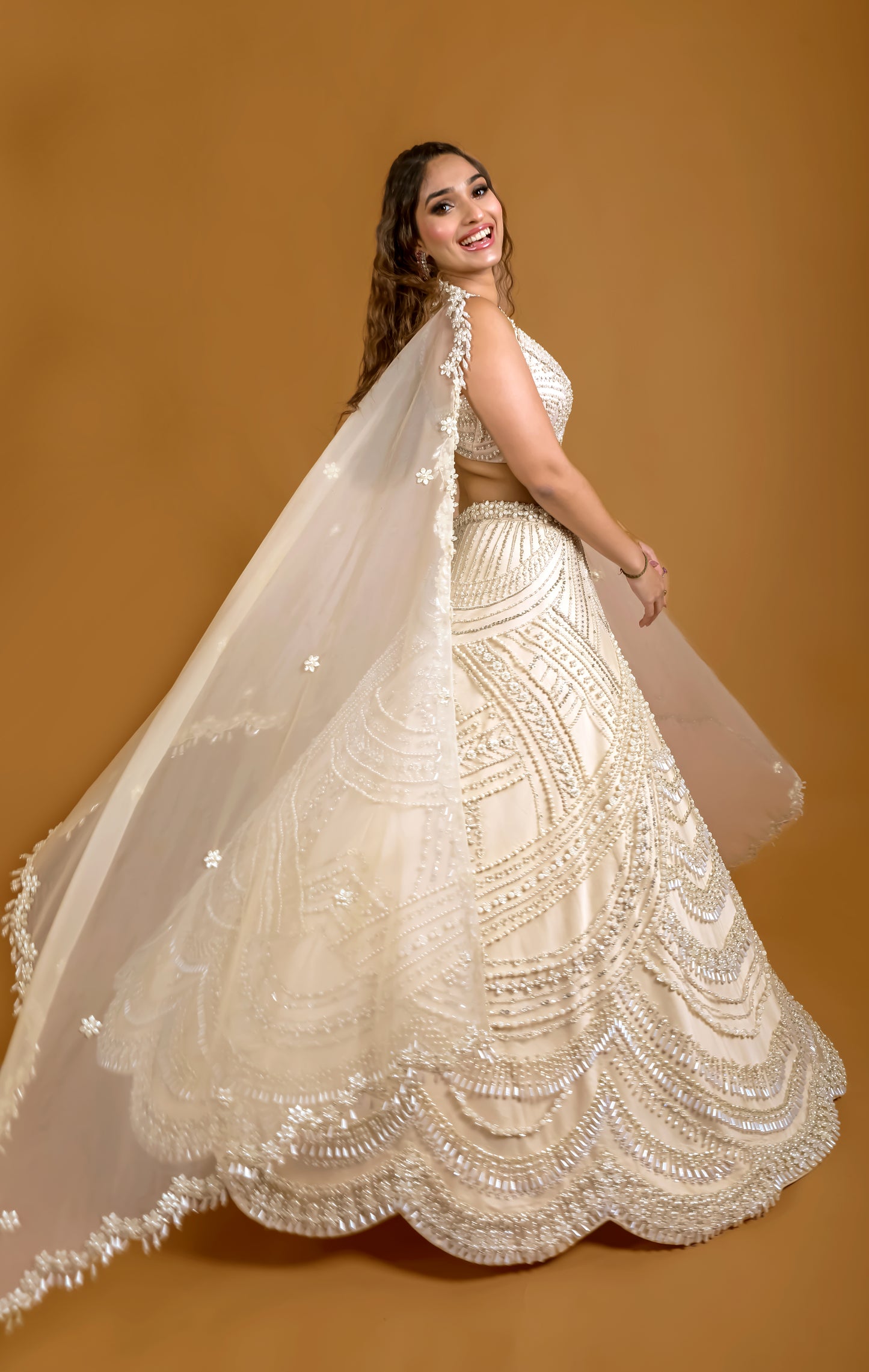 Tasheen Rahimtoola in Champagne Queen of Pearl Lehenga Set