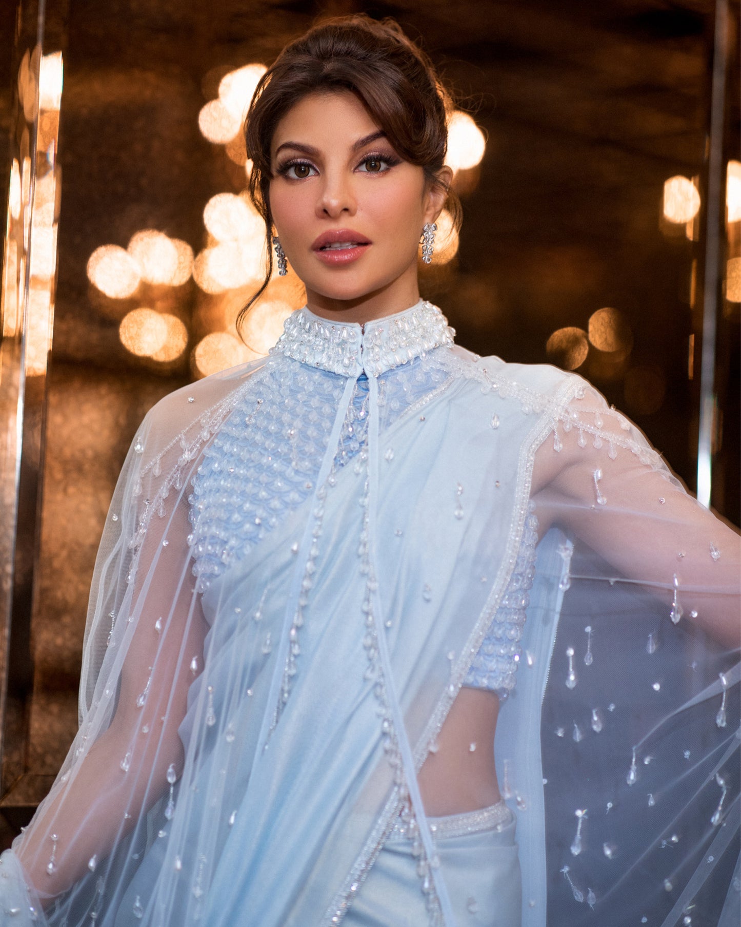Jacqueliene Fernandez in Blue Georgette Embroidered Saree Set