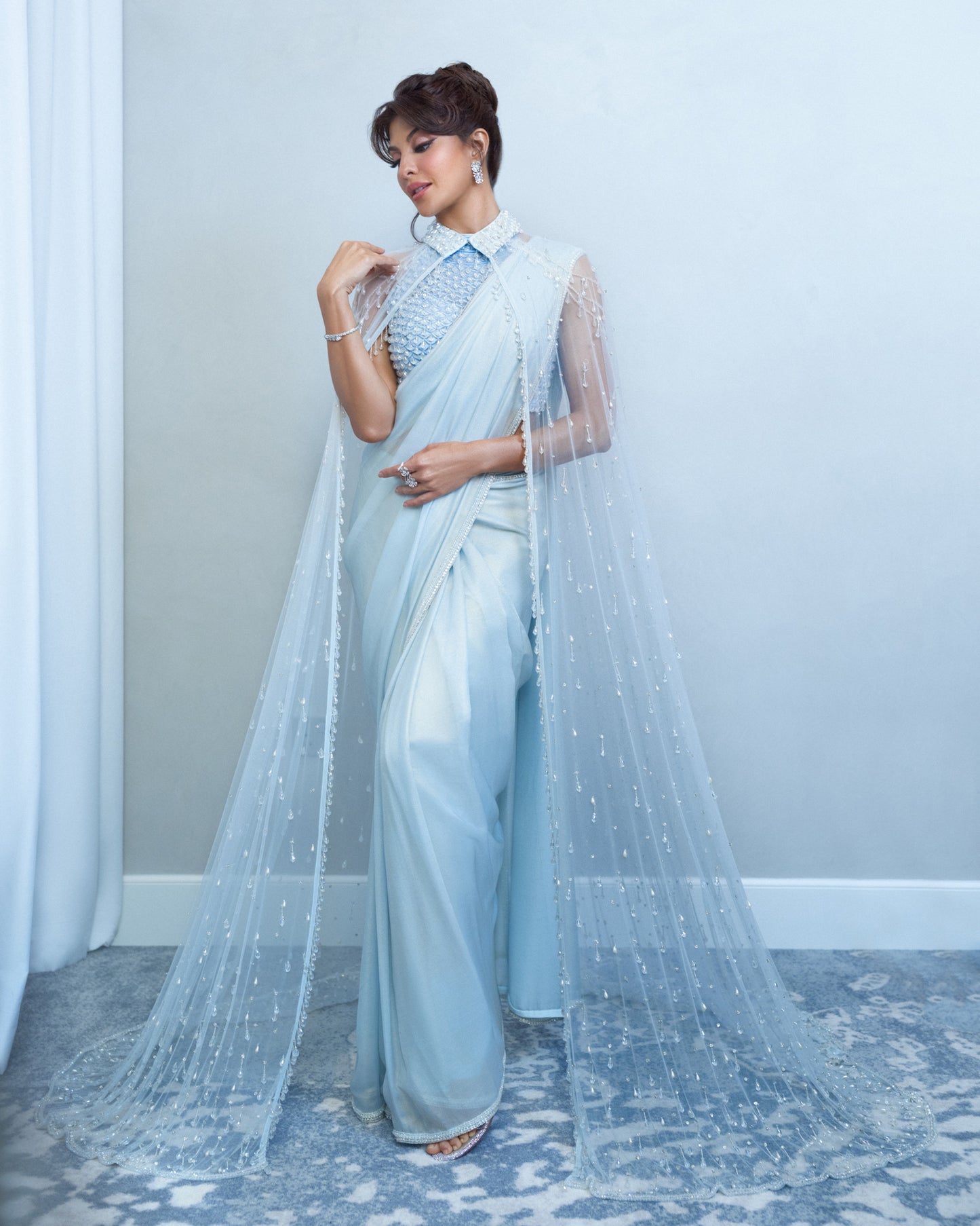 Jacqueliene Fernandez in Blue Georgette Embroidered Saree Set