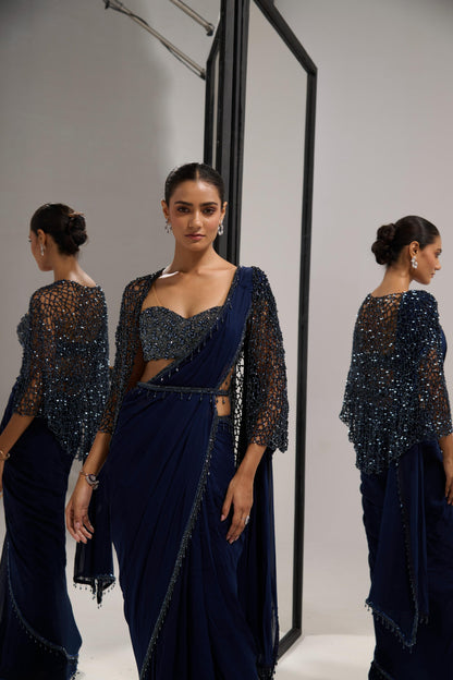Navy blue saree set with
 crystal cape